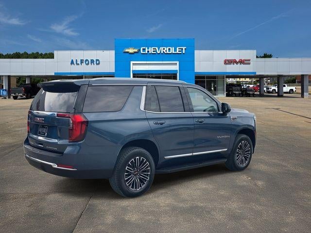 2026 GMC Yukon — rear three-quarter view