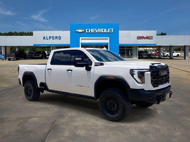 2024 GMC Sierra 2500 HD AT4X in Summit White — front three-quarter view