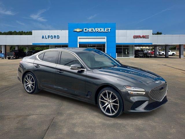 2023 Genesis G70 2.0T in Makalu Gray — front three-quarter view